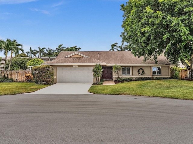 3920 NW 20th St, Coconut Creek, FL 33066 - ranch-style home with an attached garage, driveway, and stucco siding