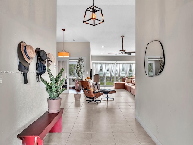 3920 NW 20th St, Coconut Creek, FL 33066 - living area with ceiling fan, light tile patterned flooring, and recessed lighting