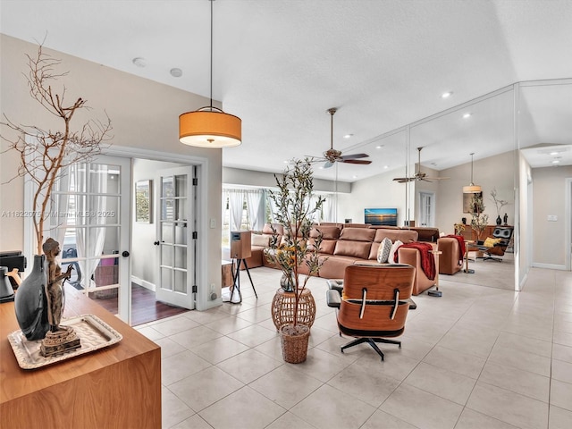 3920 NW 20th St, Coconut Creek, FL 33066 - living room with light tile patterned floors, ceiling fan, vaulted ceiling, and recessed lighting