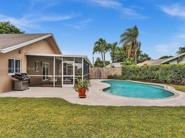 3920 NW 20th St, Coconut Creek, FL 33066 - view of swimming pool with a sunroom, a fenced backyard, a patio, and area for grilling