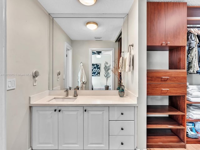 3920 NW 20th St, Coconut Creek, FL 33066 - bathroom with vanity and a ceiling fan