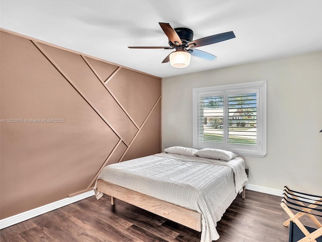 3920 NW 20th St, Coconut Creek, FL 33066 - bedroom with wood finished floors and a ceiling fan