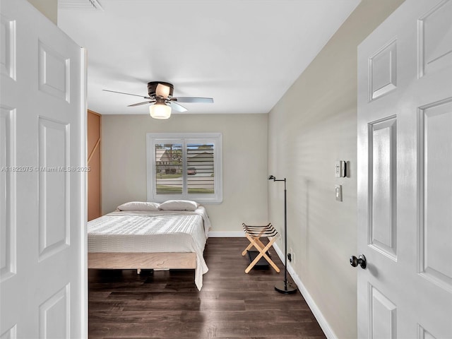 3920 NW 20th St, Coconut Creek, FL 33066 - bedroom featuring dark wood finished floors and a ceiling fan