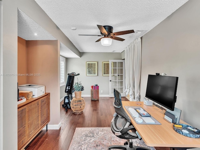 3920 NW 20th St, Coconut Creek, FL 33066 - home office with ceiling fan, hardwood / wood-style flooring, and a textured ceiling