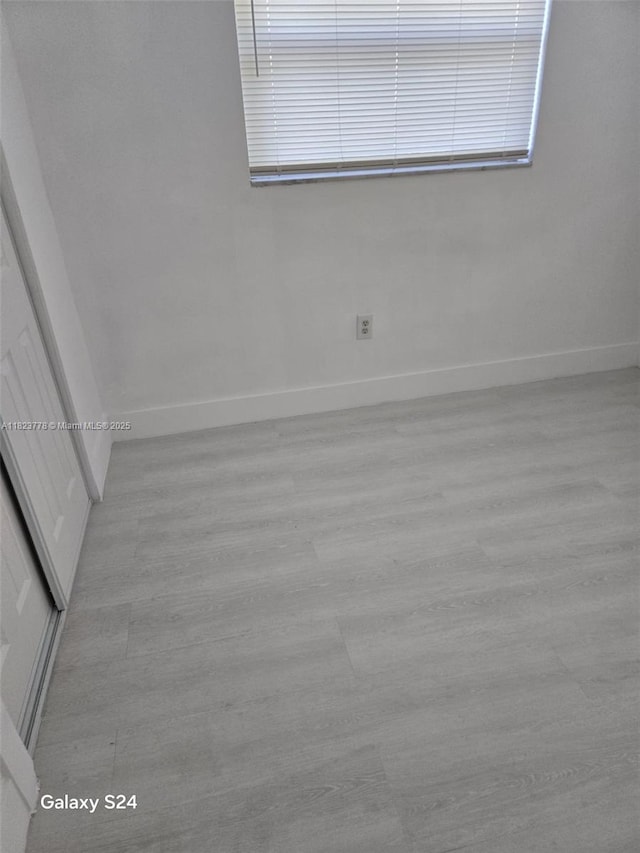 1000 W 28th St Unit 17, Hialeah, FL 33010 - unfurnished room featuring wood finished floors