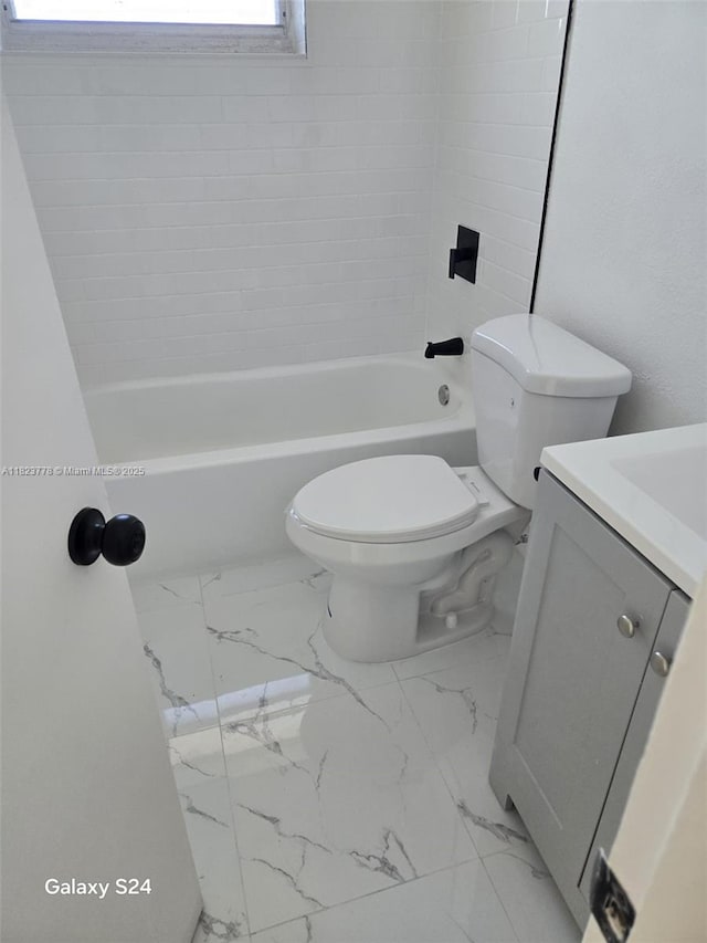 1000 W 28th St Unit 17, Hialeah, FL 33010 - bathroom with marble finish floors, vanity, and shower / tub combination