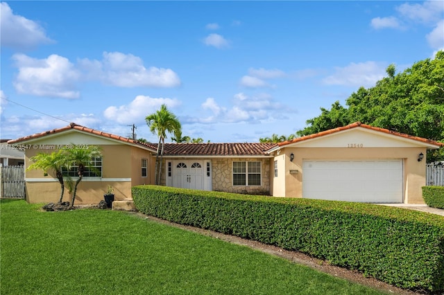 12540 SW 31st St, Miami, FL 33175 - view of front of property featuring stucco siding, an attached garage, and a tiled roof