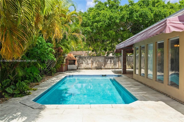 12540 SW 31st St, Miami, FL 33175 - view of pool with a patio and a fenced backyard