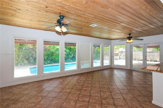 12540 SW 31st St, Miami, FL 33175 - unfurnished sunroom with healthy amount of natural light and wooden ceiling