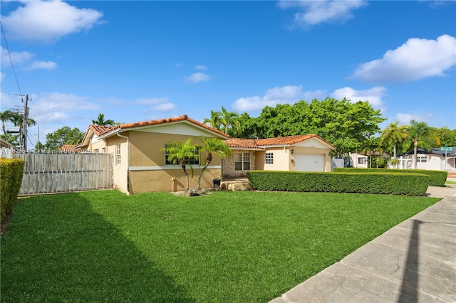 12540 SW 31st St, Miami, FL 33175 - mediterranean / spanish-style house featuring stucco siding, a tiled roof, and an attached garage