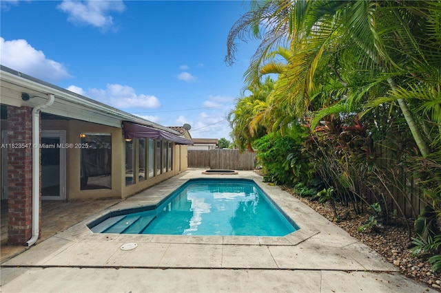 12540 SW 31st St, Miami, FL 33175 - view of pool with a fenced backyard and a patio