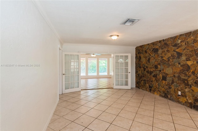 12540 SW 31st St, Miami, FL 33175 - unfurnished room with crown molding, light tile patterned flooring, and a ceiling fan
