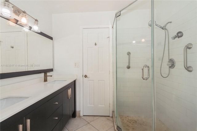 12540 SW 31st St, Miami, FL 33175 - full bathroom with a shower stall, double vanity, and tile patterned floors