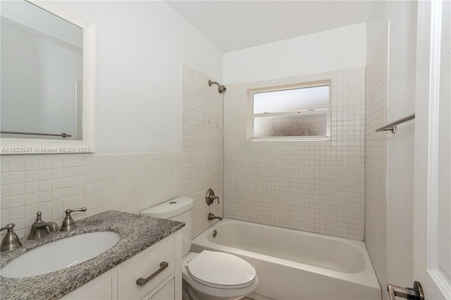 12540 SW 31st St, Miami, FL 33175 - full bath featuring tile walls,  shower combination, vanity, and backsplash