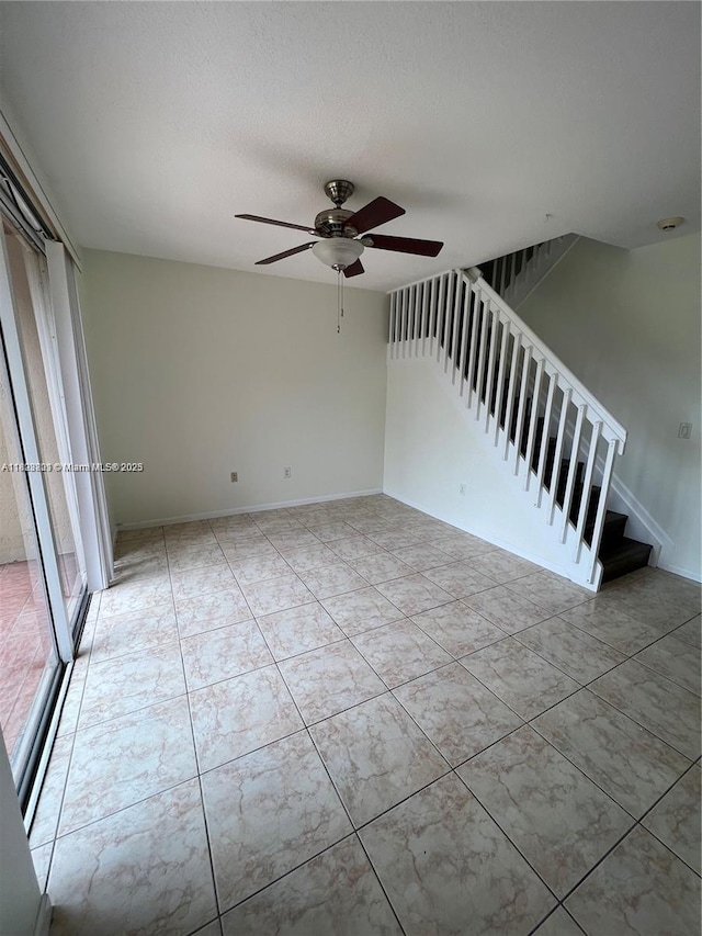 185 Riverwalk Cir, Sunrise, FL 33326 - unfurnished room with ceiling fan and stairway