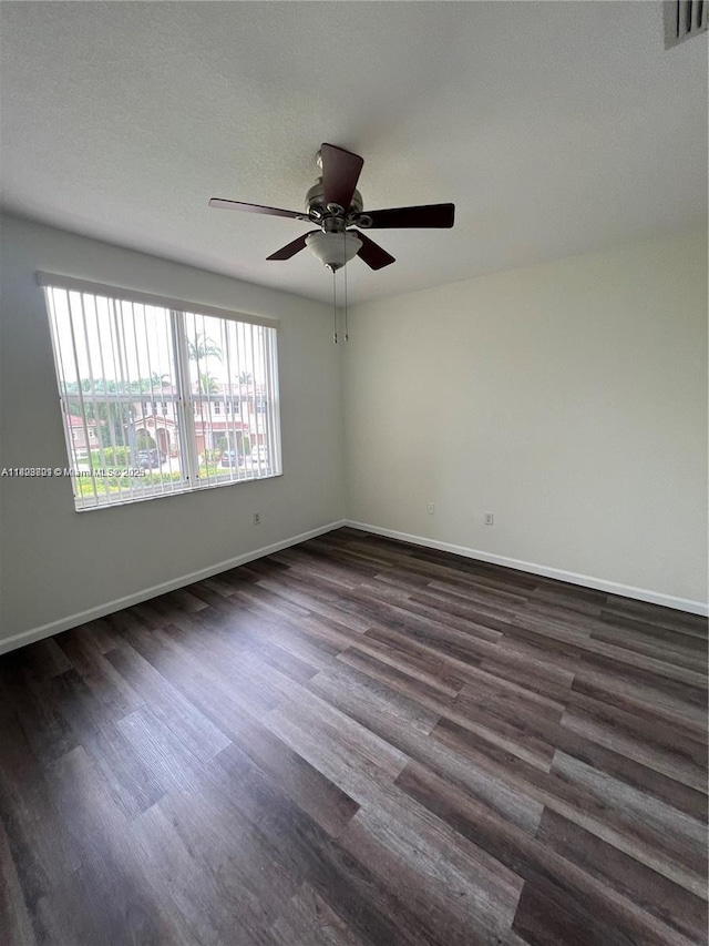 185 Riverwalk Cir, Sunrise, FL 33326 - spare room featuring dark wood-style floors and a ceiling fan