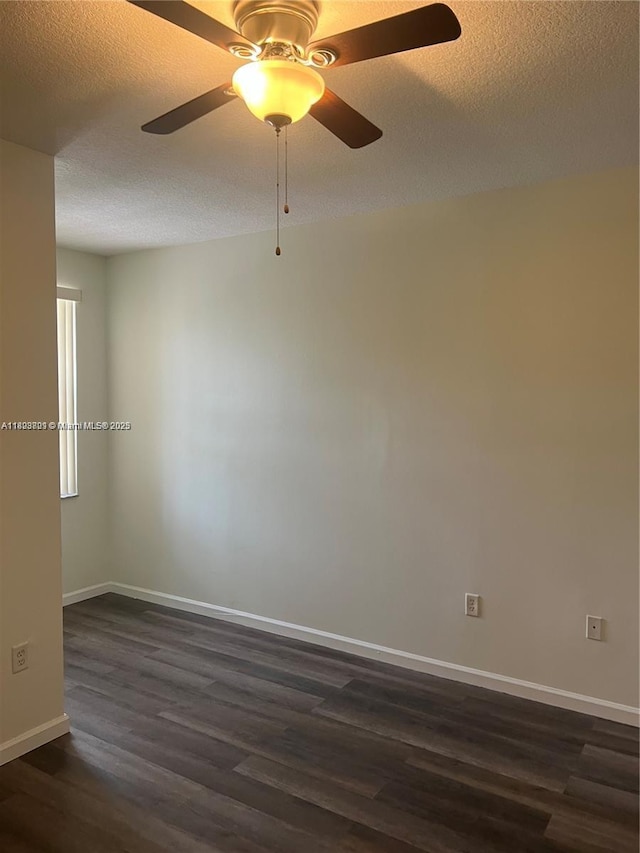 185 Riverwalk Cir, Sunrise, FL 33326 - spare room with dark wood finished floors, ceiling fan, and a textured ceiling