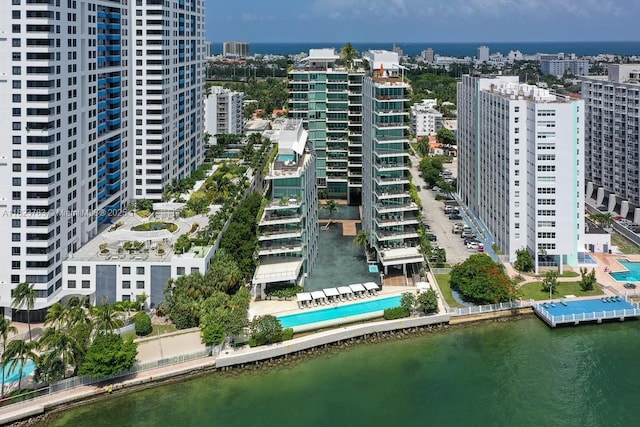 1300 Monad Ter Unit 9D, Miami Beach, FL 33139 - view of urban area with a pool and a large body of water