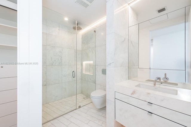 1300 Monad Ter Unit 9D, Miami Beach, FL 33139 - full bath with a shower stall, vanity, tile walls, and tile patterned flooring