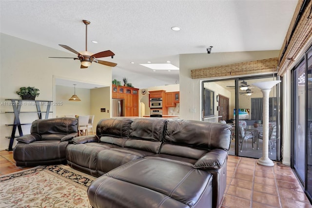 1180 NW 100th Way, Plantation, FL 33322 - living room featuring ceiling fan, vaulted ceiling, recessed lighting, and a textured ceiling
