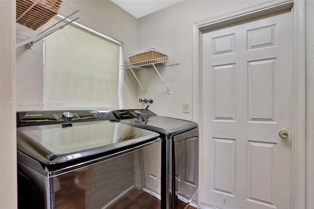 1180 NW 100th Way, Plantation, FL 33322 - laundry area with washing machine and clothes dryer and dark wood-style flooring