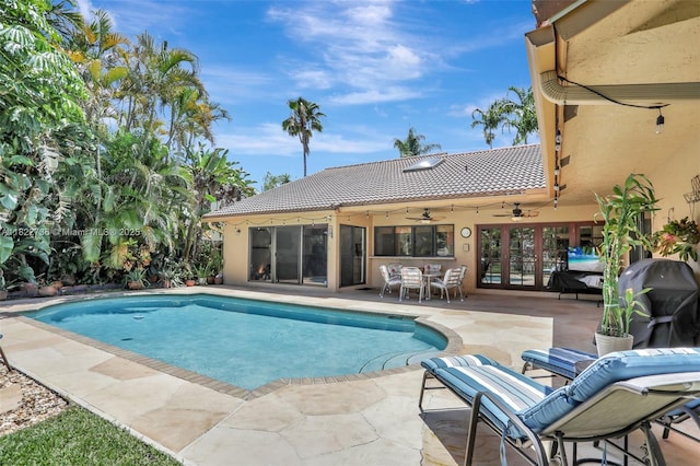 1180 NW 100th Way, Plantation, FL 33322 - outdoor pool with a ceiling fan, a patio, and french doors