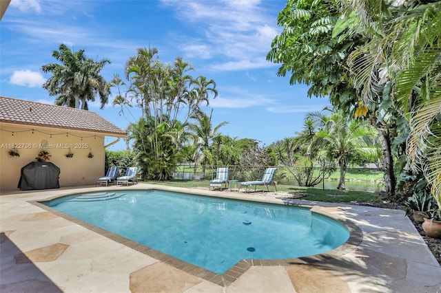 1180 NW 100th Way, Plantation, FL 33322 - view of swimming pool featuring a patio