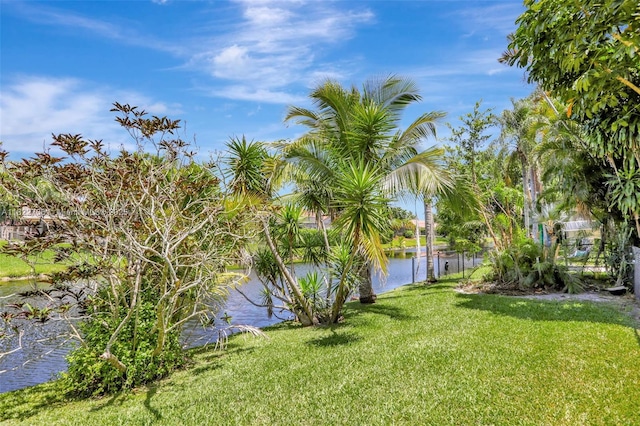 1180 NW 100th Way, Plantation, FL 33322 - view of green lawn with a water view