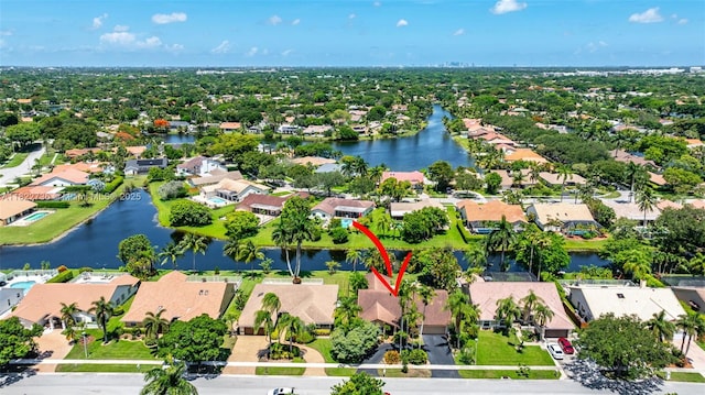1180 NW 100th Way, Plantation, FL 33322 - aerial view of residential area featuring a large body of water