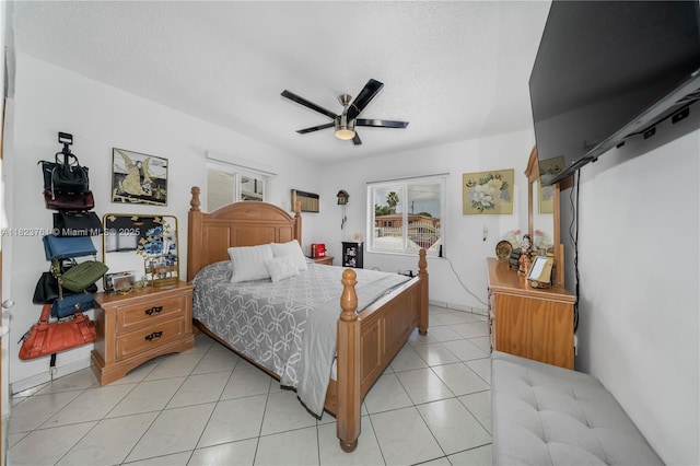 359 E 19th St, Hialeah, FL 33010 - bedroom featuring multiple windows, a ceiling fan, and light tile patterned flooring