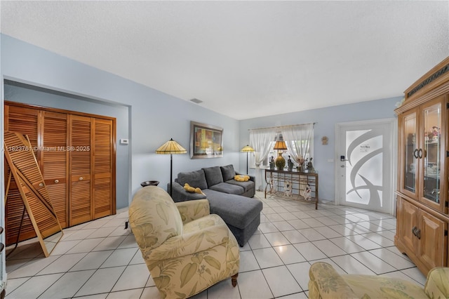 359 E 19th St, Hialeah, FL 33010 - living room featuring light tile patterned floors