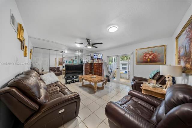 359 E 19th St, Hialeah, FL 33010 - living area featuring ceiling fan, french doors, and light tile patterned flooring