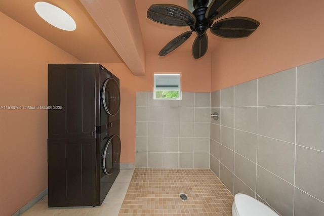 359 E 19th St, Hialeah, FL 33010 - full bathroom featuring stacked washer and clothes dryer, a tile shower, ceiling fan, and tile patterned floors