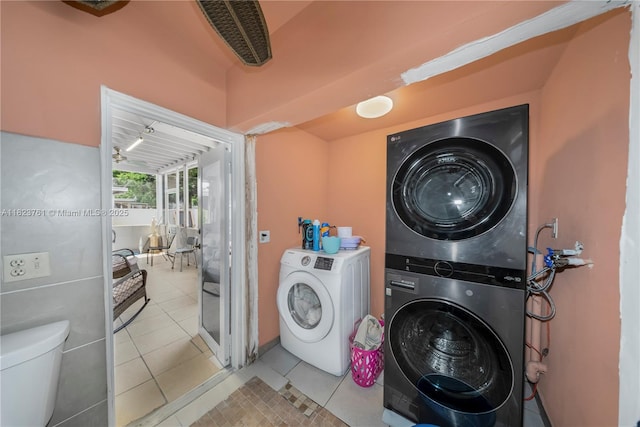 359 E 19th St, Hialeah, FL 33010 - laundry room with stacked washer / drying machine and tile patterned floors