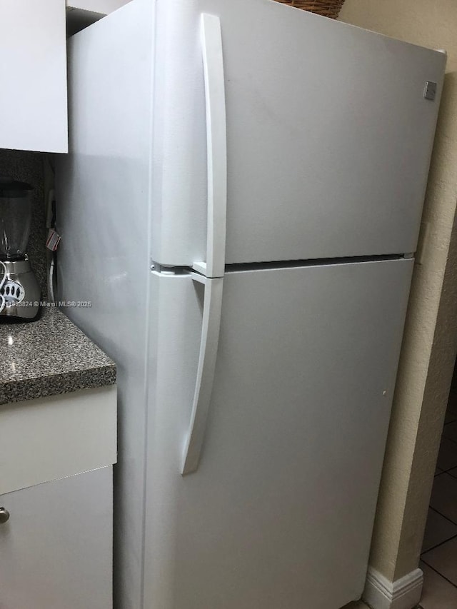 17255 SW 95th Ave Unit 153, Palmetto Bay, FL 33157 - kitchen featuring freestanding refrigerator and tile patterned floors