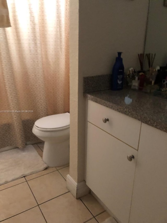 17255 SW 95th Ave Unit 153, Palmetto Bay, FL 33157 - full bathroom with vanity, tile patterned floors, and a shower with shower curtain