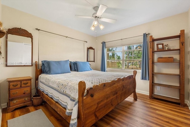 404 NE 11th Ave, Pompano Beach, FL 33060 - bedroom with wood finished floors and ceiling fan