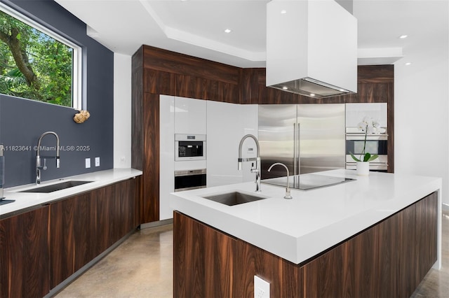 10620 SW 74th Ave, Pinecrest, FL 33156 - kitchen featuring modern cabinets, appliances with stainless steel finishes, light countertops, finished concrete flooring, and a raised ceiling