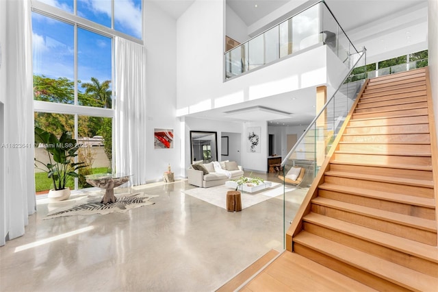 10620 SW 74th Ave, Pinecrest, FL 33156 - staircase with a towering ceiling and healthy amount of natural light