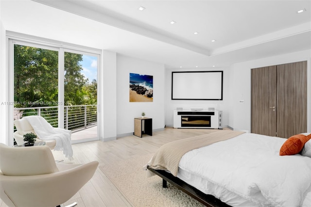 10620 SW 74th Ave, Pinecrest, FL 33156 - bedroom with access to outside, light wood-type flooring, and recessed lighting