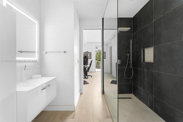 10620 SW 74th Ave, Pinecrest, FL 33156 - full bathroom featuring vanity, a walk in shower, and wood finished floors