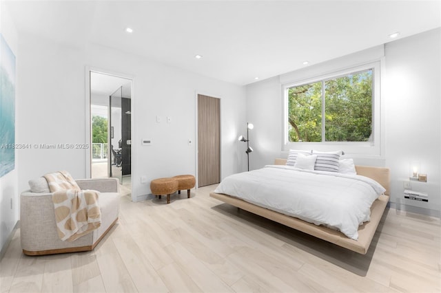 10620 SW 74th Ave, Pinecrest, FL 33156 - bedroom with multiple windows, recessed lighting, and light wood-type flooring