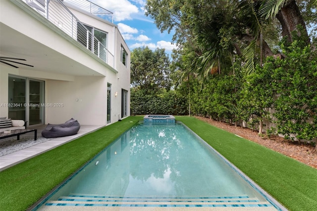 10620 SW 74th Ave, Pinecrest, FL 33156 - view of swimming pool with a pool with connected hot tub
