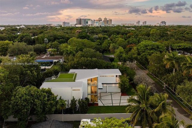 10620 SW 74th Ave, Pinecrest, FL 33156 - aerial view at dusk of a view of city and view of scattered trees