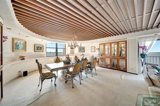 1800 NE 114th St Unit 604, Miami, FL 33181 - dining space with carpet flooring and a chandelier