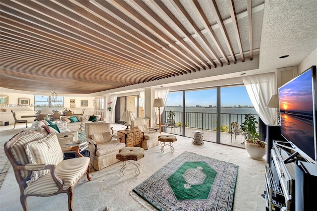 1800 NE 114th St Unit 604, Miami, FL 33181 - living area with carpet and a chandelier