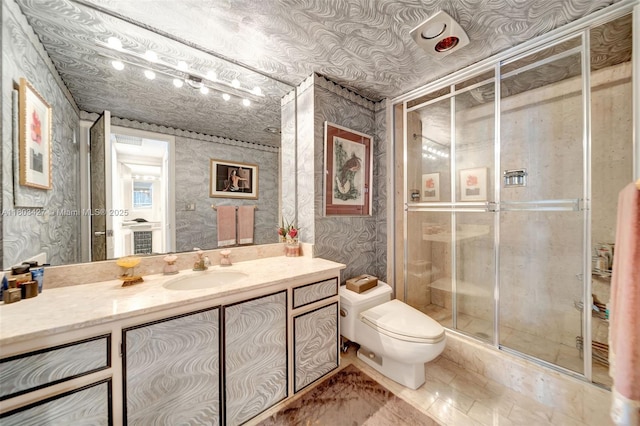 1800 NE 114th St Unit 604, Miami, FL 33181 - bathroom featuring wallpapered walls, vanity, and a stall shower
