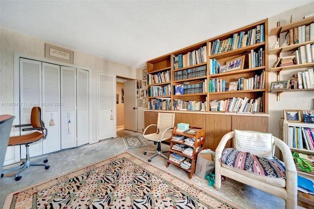 1800 NE 114th St Unit 604, Miami, FL 33181 - sitting room with concrete floors and a textured ceiling