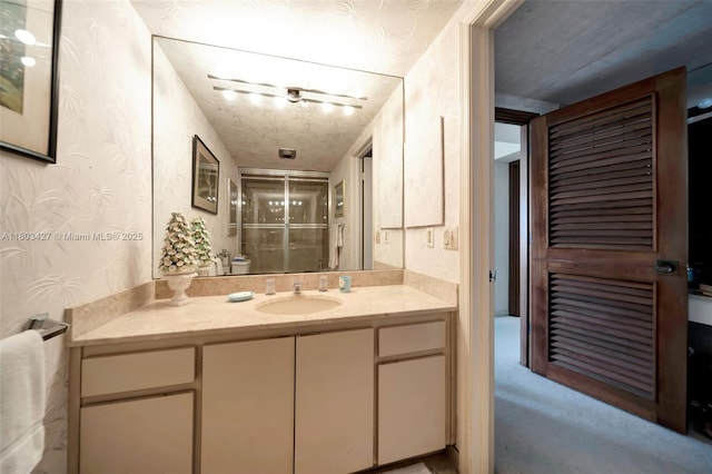 1800 NE 114th St Unit 604, Miami, FL 33181 - full bathroom featuring vanity, wallpapered walls, and a shower