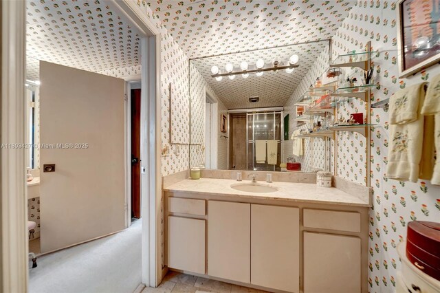 1800 NE 114th St Unit 604, Miami, FL 33181 - full bathroom featuring wallpapered walls, vanity, and a stall shower
